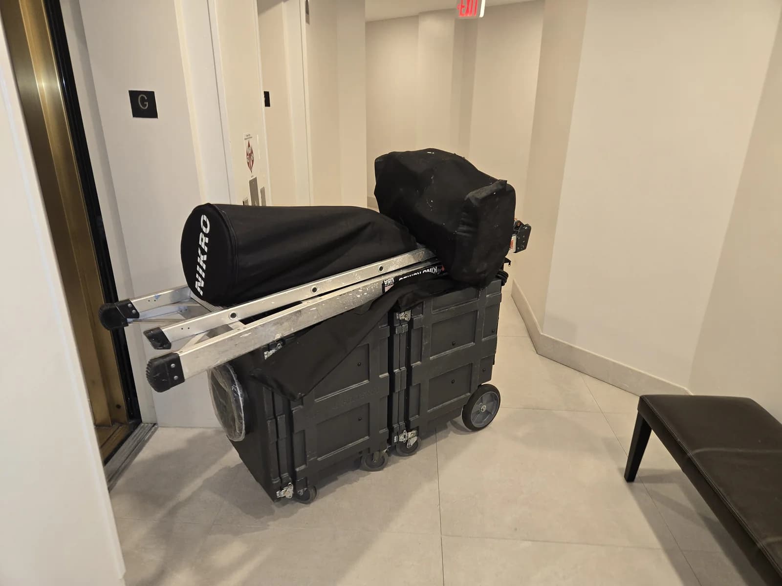 Ventilocos equipment organized on a wheeled cart in a clean hallway
