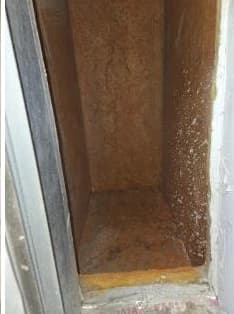 Deteriorated rectangular duct surface before restoration