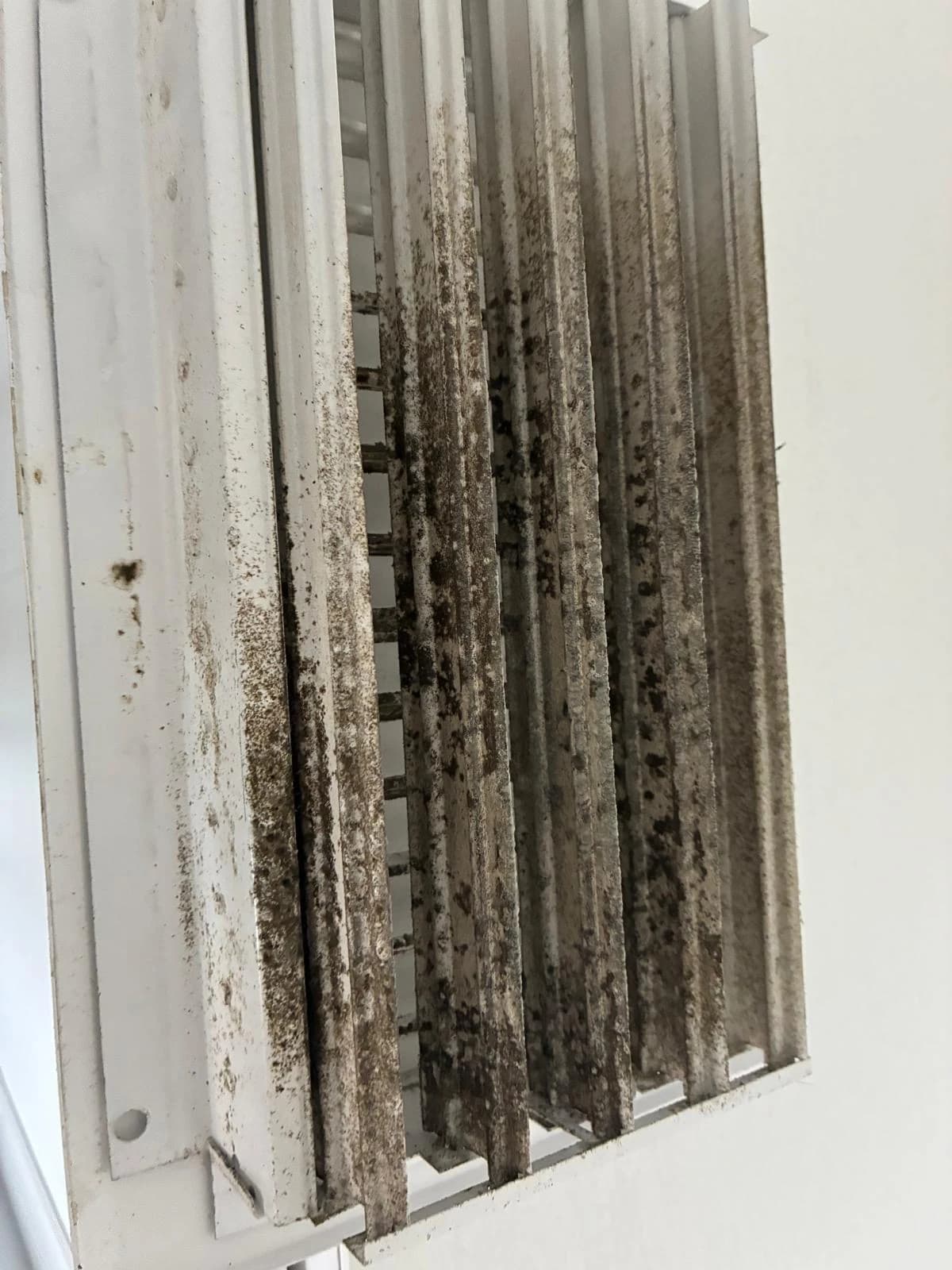 Rectangular supply register before cleaning